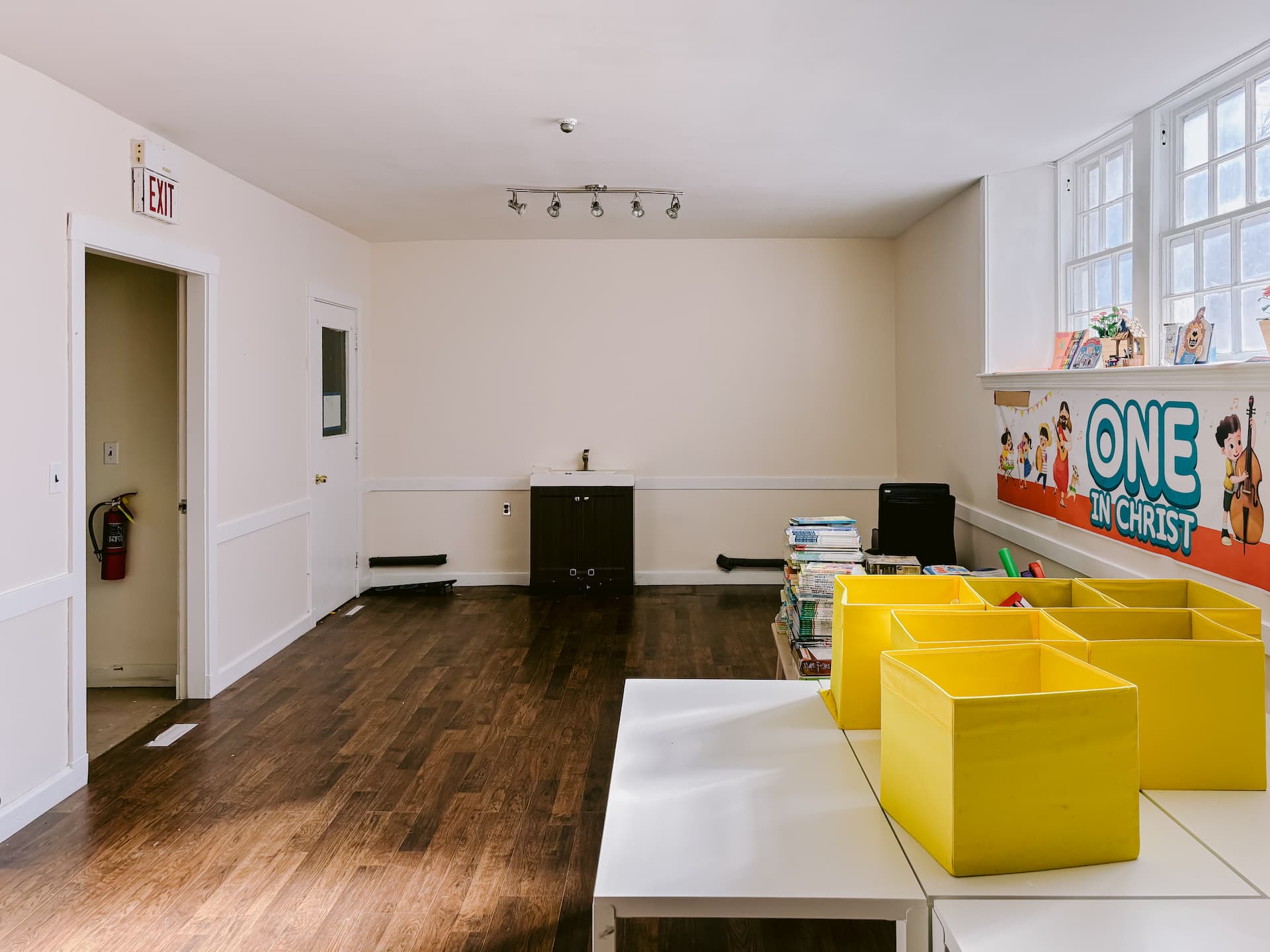 Current classroom with sink and open floor area